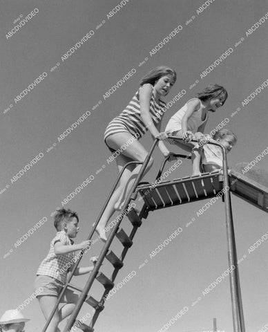 crp-01658 1963 Liliane Brousse and the kids go down the slide at beach Hammer film Maniac crp-01658