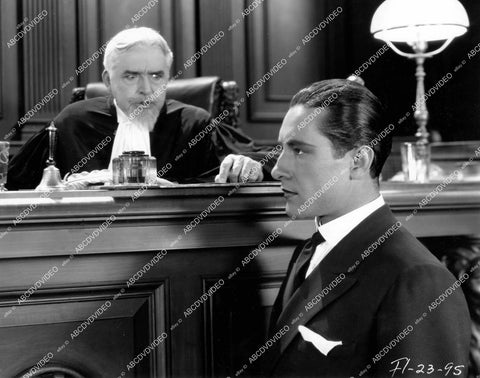 crp-17758 1929 Paul Vincent stands before the judge silent film The Veiled Woman crp-17758