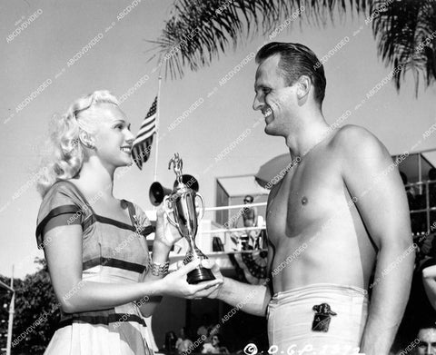 crp-18100 1947 beautiful Adele Jergens w shirtless swimmer Harry Holiday new record holder at Beverly-Wilshire Hotel crp-18100