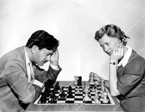 crp-18378 circa 1941 Penny Singleton plays chess w Herman Steiner U.S. Olympic team member & International chess master crp-18378
