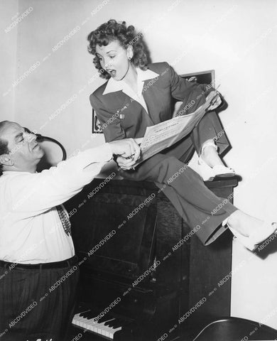 crp-18479 1946 Janet Blair & Columbia music advisor rehearse song I'm Glad I Waited for You film Tars and Spars crp-18479