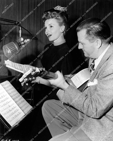 crp-18481 1946 Janet Blair & guitarist Eddie Skrivanek rehearse for film Tars and Spars crp-18481