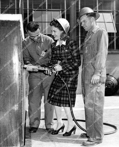 crp-18491 1942 Janet Blair goes Rosie the Riveter for WWII war effort crp-18491