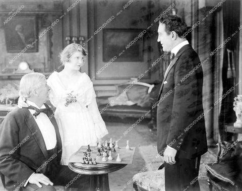 crp-18824 1918 Mae Marsh, Clifford Bruce, William T Carleton and chess board silent film The Racing Strain crp-18824