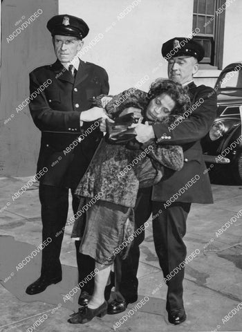 crp-01932 1937 news photo San Francisco spinster Rose Mega wrestles w cops attempts suicide from Bay Bridge crp-01932
