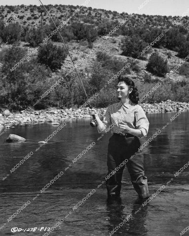 crp-02084 1953 candid Donna Reed does some fishing Oak Creek Ariz on location film Gun Fury crp-02084