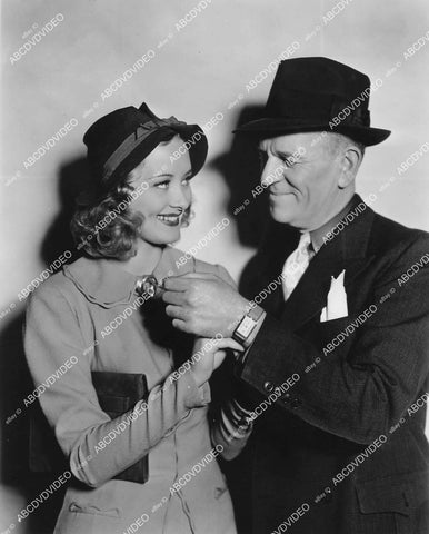 crp-02632 1936 candid Marian Marsh gives George McKay wrist watch birthday present on set crp-02632