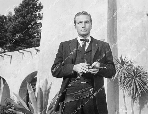 crp-02871 1959 Eric Fleming loading his six shooter film Curse of the Undead crp-02871