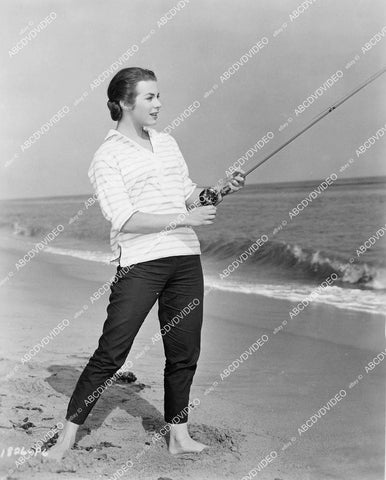 crp-03768 1957 photo Marianne Cook fishing on the beach film Four Girls in Town crp-03768