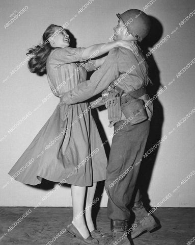 crp-04073 1958 candid Taina Elg, Red Buttons do some dancing between scenes film Imitation General crp-04073