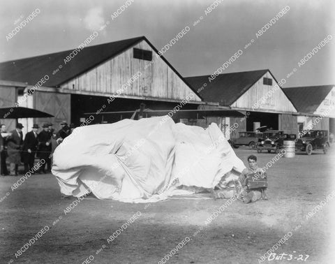 crp-04555 1928 Nick Stuart parachuting w newsreel camera silent film News Parade crp-04555