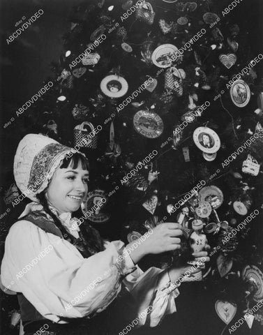 crp-04809 1976 girl decorates 25 foot high Christmas tree TV Christmas Around the World Nation of Nations crp-04809