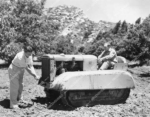 crp-05122 1941 Alexander Hall w his tank tractor on turkey ranch in Santa Susanna, Calif crp-05122