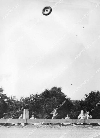 crp-00519 news photo auto racing action shot of tire wheel flying through the air unknown race crp-00519