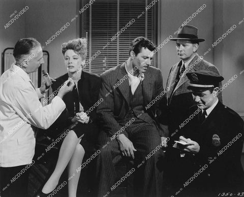 crp-05248 1945 Signe Hasso & James Craig get medical attention film Dangerous Partners crp-05248