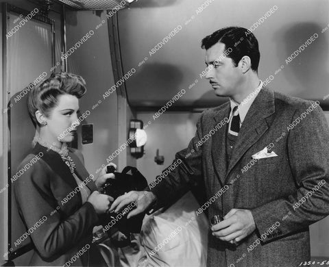 crp-05249 1945 Signe Hasso, James Craig in train comparment film Dangerous Partners crp-05249