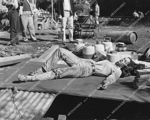 crp-05278 1961 candid Joyce Taylor napping in the sun on location film Ring of Fire crp-05278