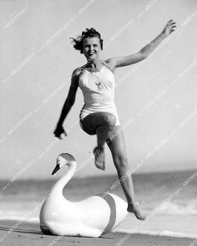crp-05294 1936 Marion Talley in new swimwear jumps over swan Santa Monica Beach crp-05294