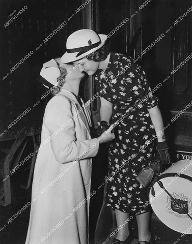 crp-05957 1940's trains young lady greeted by her mother at train station crp-05957