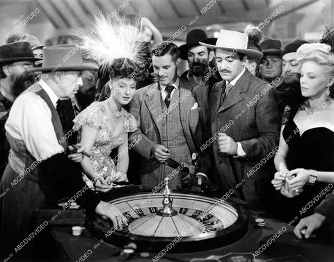 crp-06136 1943 Ann Savage, Tom Neal, Constance Worth at roulette wheel film Klondike Kate crp-06136