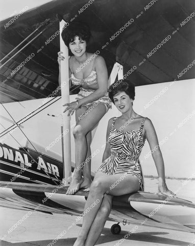 crp-00719 1950s LA models Michele Schwab,Daphne Ward bikini clad aerobats sitting on wing of airplane crp-00719