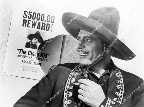 crp-08333 1939 Warner Baxter looks at his reward poster film Return of the Cisco Kid crp-08333