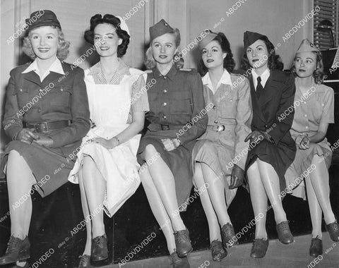 crp-00906 1942 WWII news photo 6 official uniforms for women-Air Raid Warden-nurse-indoor worker-Red Cross-canteen worker crp-00906